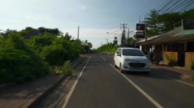 sunset time bali island jimbaran area scooter road trip pov panorama 4k indonesia