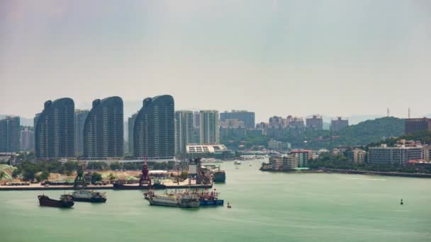 日落时间三亚城市海湾屋顶全景4K 时间拉塞海南岛中国 — 图库视频影像