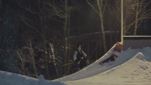Extreme skier to slide on the rails — Stock Video