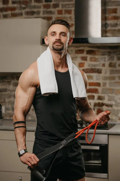 Muscular Man White Towel Shoulders Posing Pull Elastic Rope His — Stock Photo, Image