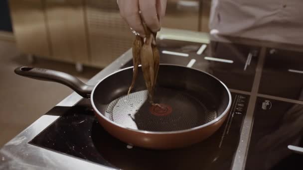 Pan Boiling Oil Throwing Fresh Octopuses Which Started Frying Kitchen — Stock Video