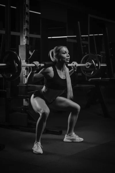 Fit Woman Blonde Hair Squatting Barbell Squat Rack Gym Girl — Stock Photo, Image