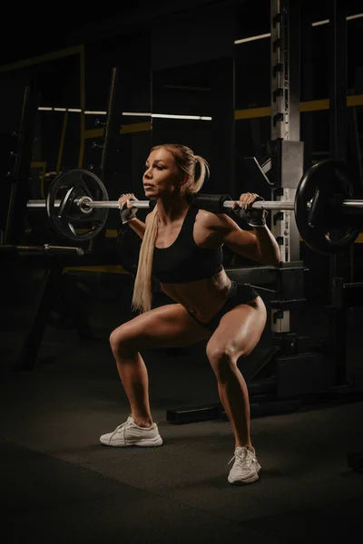 Fit Woman Blonde Hair Squatting Barbell Squat Rack Gym Girl — Stock Photo, Image