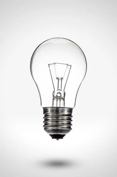 Turned off Light bulb floating above a gradient background with shadow — Stock Photo, Image