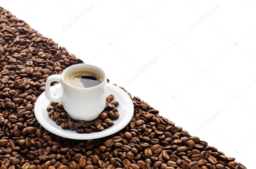 Coffee cup and beans isolated on white background