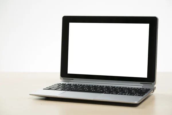 Frontansicht von Laptop / Tablet auf einem Holztisch — Stockfoto