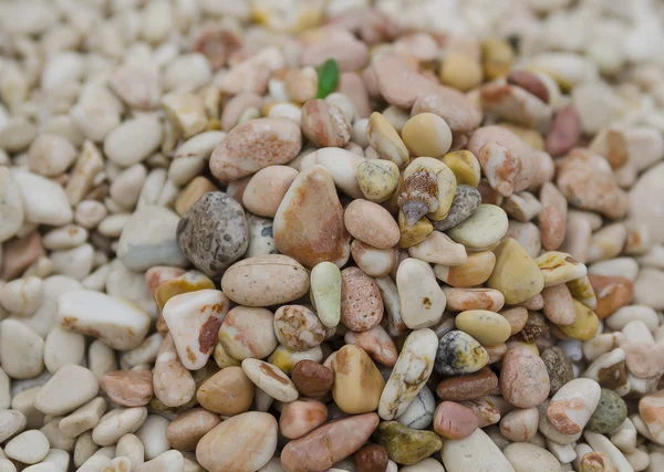 Colored stones in cala mariolu Stock Picture