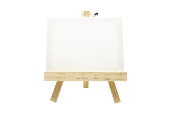 Mini dřevěný stojan s prázdné plátno rám izolované Stock Snímky