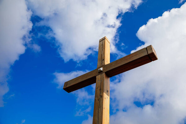Cross on the mountain under medieval monastery, Saint John under the Cliff (Svaty Jan pod Skalou), Central Bohemia, Czech Republic, October 24, 2020