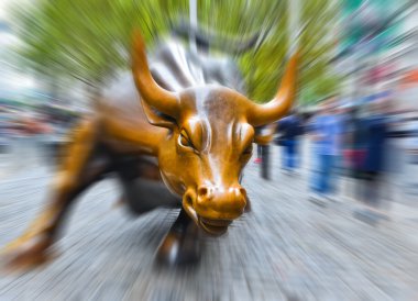 Charging Bull sculpture on the Wall Street in New York City clipart