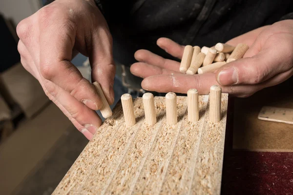 Veel houten deuvel pinnen — Stockfoto