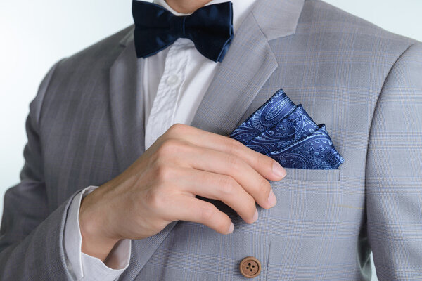 grey suit plaid texture, bowtie, pocket square