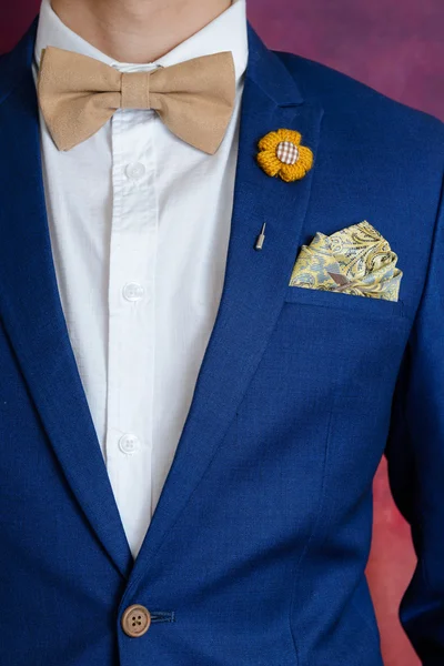 Man in blue suit bowtie, pocket square — Stock Photo, Image