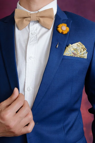 Man in blue suit bowtie, pocket square — Stock Photo, Image