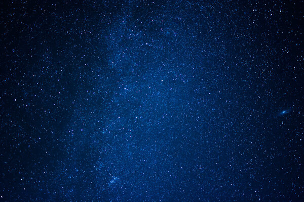 blue dark background of the starry sky