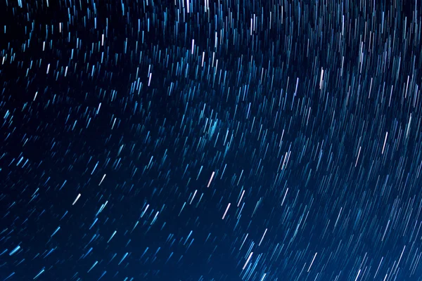 A mozgás, a háttérben a éjszakai égbolton csillagok — Stock Fotó
