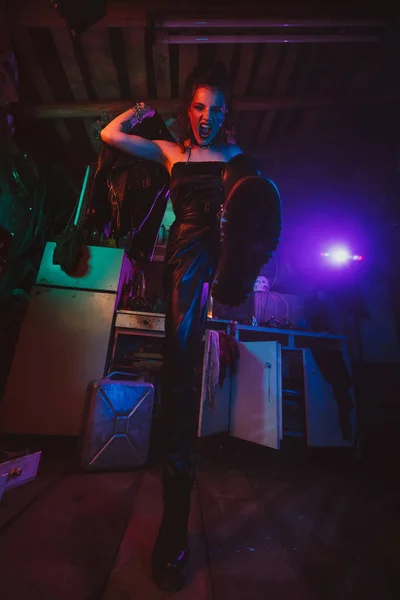 Cyberpunk female cosplay with neon lighting. A girl in a steampunk costume — Stock Photo, Image