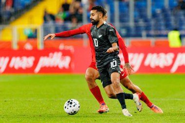 Jakub Kiwior and Sarpreet Singh seen  during International friendly game between national teams of Poland and  New Zealand (Maciej Rogowski/Ball Raw Images)
