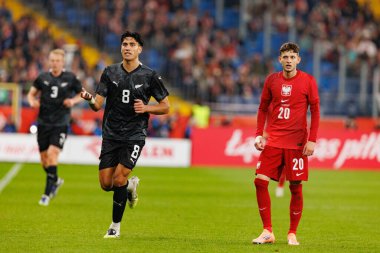 Marko Stamenic and Sebastian Szymanski seen  during International friendly game between national teams of Poland and  New Zealand (Maciej Rogowski/Ball Raw Images)