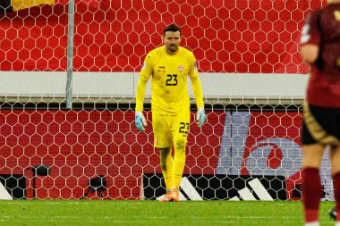 Dünya Kupası 2026 Avrupa ön eleme maçında Belçika ve Kuzey Makedonya milli takımları arasında görülen Dimitrievski 'yi çaldı (Maciej Rogowski / Ball Raw Images)