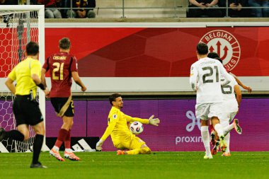 Dünya Kupası 2026 Avrupa ön eleme maçında Belçika ve Kuzey Makedonya milli takımları arasında görülen Dimitrievski 'yi çaldı (Maciej Rogowski / Ball Raw Images)