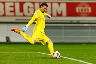 Dünya Kupası 2026 Avrupa ön eleme maçında Belçika ve Kuzey Makedonya milli takımları arasında görülen Dimitrievski 'yi çaldı (Maciej Rogowski / Ball Raw Images)