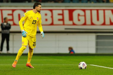 Dünya Kupası 2026 Avrupa ön eleme maçında Belçika ve Kuzey Makedonya milli takımları arasında görülen Dimitrievski 'yi çaldı (Maciej Rogowski / Ball Raw Images)