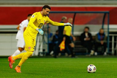 Dünya Kupası 2026 Avrupa ön eleme maçında Belçika ve Kuzey Makedonya milli takımları arasında görülen Dimitrievski 'yi çaldı (Maciej Rogowski / Ball Raw Images)