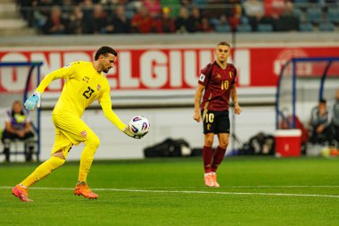 Dünya Kupası 2026 Avrupa ön eleme maçında Belçika ve Kuzey Makedonya milli takımları arasında görülen Dimitrievski 'yi çaldı (Maciej Rogowski / Ball Raw Images)