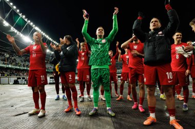 Kamil Grosicki, Matty Cash, Lukasz Skorupski ve Piotr Zielinski, 2026 Dünya Kupası 'nda Litvanya ve Polonya milli takımları arasında oynanan Avrupa ön eleme maçında görüldü (Maciej Rogowski / Ball Raw Images))