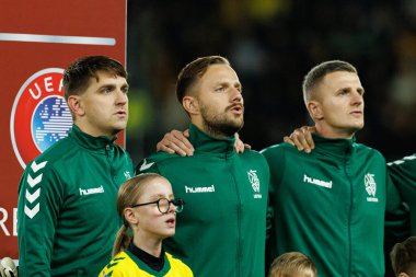 Fedor Cernych, Tomas Svedkauskas ve Edvinas Girdvainis, 2026 Dünya Kupası 'nda Litvanya ve Polonya milli takımları arasında oynanan Avrupa eleme maçında görüldü (Maciej Rogowski / Ball Raw Images))