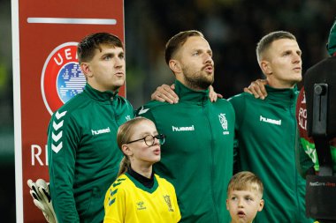 Fedor Cernych, Tomas Svedkauskas ve Edvinas Girdvainis, 2026 Dünya Kupası 'nda Litvanya ve Polonya milli takımları arasında oynanan Avrupa eleme maçında görüldü (Maciej Rogowski / Ball Raw Images))