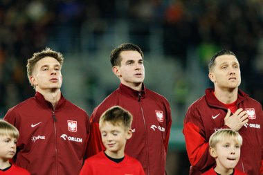 Michal Skoras, Jakub Kaminski ve Piotr Zielinski, 2026 Dünya Kupası 'nda Litvanya ve Polonya milli takımları arasında oynanan Avrupa eleme maçında görüldü (Maciej Rogowski / Ball Raw Images)