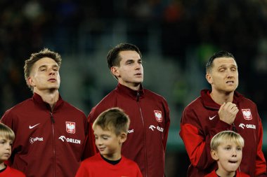 Michal Skoras, Jakub Kaminski ve Piotr Zielinski, 2026 Dünya Kupası 'nda Litvanya ve Polonya milli takımları arasında oynanan Avrupa eleme maçında görüldü (Maciej Rogowski / Ball Raw Images)
