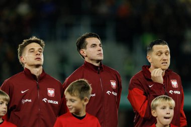 Michal Skoras, Jakub Kaminski ve Piotr Zielinski, 2026 Dünya Kupası 'nda Litvanya ve Polonya milli takımları arasında oynanan Avrupa eleme maçında görüldü (Maciej Rogowski / Ball Raw Images)