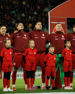 Bartosz Slisz, Jakub Kiwior, Jan Bednarek ve Lukasz Skorupski, 2026 Dünya Kupası 'nda Litvanya ve Polonya milli takımları arasında oynanan Avrupa ön eleme maçında görüldü (Maciej Rogowski / Ball Raw Images))