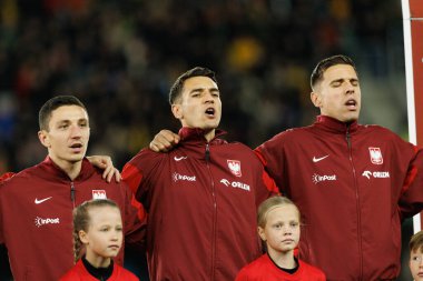 Bartosz Slisz, Jakub Kiwior ve Jan Bednarek, 2026 Dünya Kupası 'nda Litvanya ve Polonya milli takımları arasında oynanan Avrupa ön eleme maçında görüldü (Maciej Rogowski / Ball Raw Images)