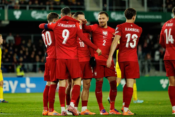 Polonyalı oyuncular, 2026 Dünya Kupası 'nda Litvanya ve Polonya milli takımları arasında oynanan Avrupa Ön eleme maçında Robert Lewandowski' den gol üstüne gol atarken görüldü (Maciej Rogowski / Ball Raw Images)