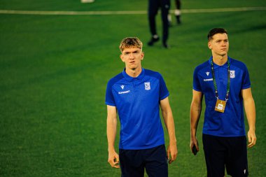 Wojciech Monka ve Krzysztof Bakowski, Lincoln Red Imps ve Lech Poznan (Maciej Rogowski / Ball Raw Images) takımları arasında oynanan UEFA Konferans Ligi faz maçında görüldüler.)