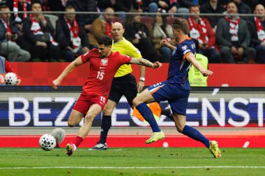 Pawel Wszolek ve Micky van de Ven, 2026 Dünya Kupası eleme maçında Polonya ve Hollanda milli takımları arasında görüldü (Maciej Rogowski / Ball Raw Images)