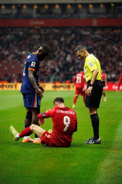 Lutsharel Geertruida ve Robert Lewandowski, 2026 Dünya Kupası eleme maçında Polonya ve Hollanda milli takımları arasında görüldü (Maciej Rogowski / Ball Raw Images)