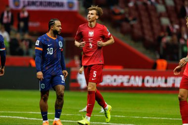 Memphis Depay ve Jan Ziolkowski, 2026 Dünya Kupası eleme maçında Polonya ve Hollanda milli takımları arasında görüldü (Maciej Rogowski / Ball Raw Images)