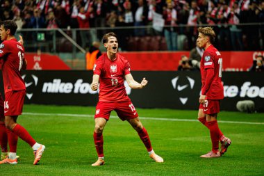 Jakub Kaminski, Polonya ve Hollanda milli takımları arasında oynanan 2026 Dünya Kupası eleme maçında gol attıktan sonra kutlama yaparken görüldü (Maciej Rogowski / Ball Raw Images)