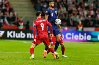 Robert Lewandowski ve Ryan Gravenberch, 2026 Dünya Kupası eleme maçında Polonya ve Hollanda milli takımları arasında görüldü (Maciej Rogowski / Ball Raw Images)