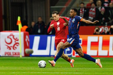 Piotr Zielinski ve Ryan Graveberch, 2026 Dünya Kupası eleme maçında Polonya ve Hollanda milli takımları arasında görüldü (Maciej Rogowski / Ball Raw Images)