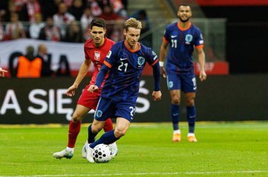 Bartosz Kapustka ve Frenkie De Jong, 2026 Dünya Kupası eleme maçında Polonya ve Hollanda milli takımları arasında görüldü (Maciej Rogowski / Ball Raw Images)