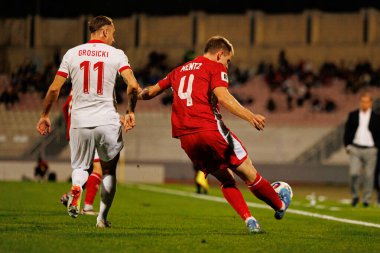 Kamil Grosicki ve Gabriel Mentz, 2026 Dünya Kupası eleme maçında Malta ve Polonya milli takımları arasında görüldü (Maciej Rogowski / Ball Raw Images)