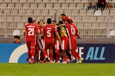 Malta 'lı oyuncular, 2026 Dünya Kupası eleme maçında Teddy Teuma' dan gol üstüne gol atarken Malta ve Polonya milli takımları arasında görüldü (Maciej Rogowski / Ball Raw Images)