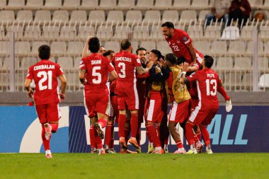 Malta 'lı oyuncular, 2026 Dünya Kupası eleme maçında Teddy Teuma' dan gol üstüne gol atarken Malta ve Polonya milli takımları arasında görüldü (Maciej Rogowski / Ball Raw Images)