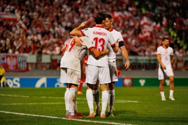 Polonyalı oyuncular, 2026 Dünya Kupası eleme maçında Michal Skoras 'ın Malta ve Polonya milli takımları arasında attığı gol üstüne golü kutlarken görüldü (Maciej Rogowski / Ball Raw Images)